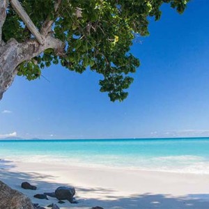 Keyonna Beach - Luxury Antigua Honeymoon Packages - Beach with the island of Monserrat in the distance