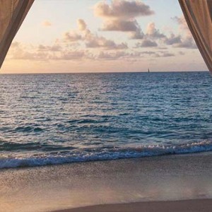 Keyonna Beach - Luxury Antigua Honeymoon Packages - Sunset on bali bed