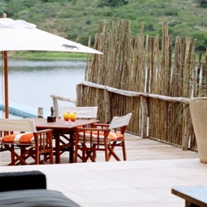 Pumba Private Game reserve - Luxury South Africa Honeymoon Packages - Water Lodge pool and lake view