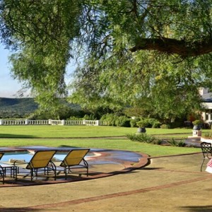 Shamwari Game Reserve - Luxury South Africa Honeymoon Packages - Long Lee Manor pool and garden