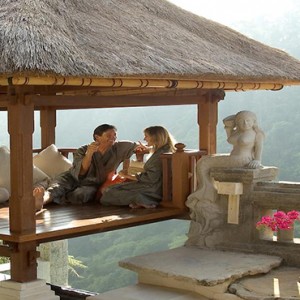 Bali Honeymoon Packages Viceroy Bali Couple Sitting In Cabana In Villa