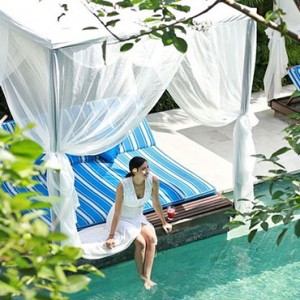 Bali Honeymoon Packages The Elysian Seminyak Women Relaxing On Pool Cabana