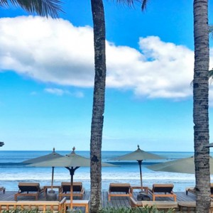 Legian Bali Seminyak - Luxury Bali Honeymoon Packages - Sun loungers on the beach