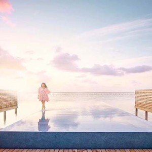 Lux South Ari Atoll - Luxury Maldives Honeymoon Packages - Temptation Pool Water Villa pool sunset