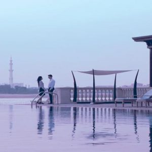 Abu Dhabi Honeymoon Packages Shangri La Hotel Qaryat Al Beri Infinity Pool At Dusk