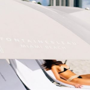 Woman Relaxing On Beach Fontainebleau Miami Beach Miami Honeymoons