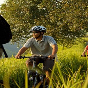 Bali Honeymoon Packages COMO Uma Ubud Biking Through Rice Fields