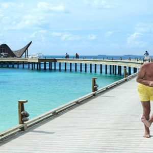 Maldives Honeymoon Package Joali Maldives Bike Riding On Jetty