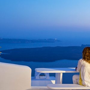 Greece Honeymoon Packages Chromata Hotel Santorini Woman Looking At Views