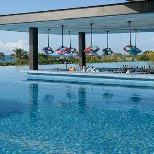 Mexico Honeymoon Packages Hotel Xcaret Resort Trajinera Swim Up Bar