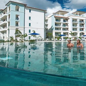 Barbados Honeymoon Packages Sandals Royal Barbados Couple In Pool