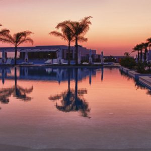 Greece Honeymoon Packages Avra Imperial Pool At Sunset1