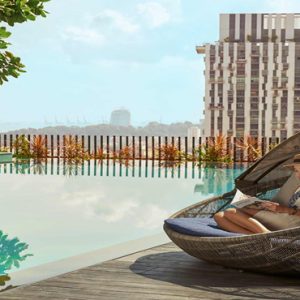 Singapore Honeymoon Packages Oasia Hotel Downtown Women In Cabana By The Pool