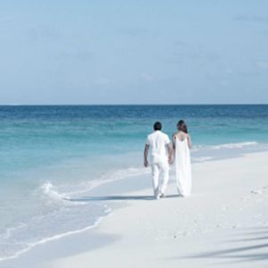 Maldives Honeymoon Packages Heritance Aarah Couple On Beach