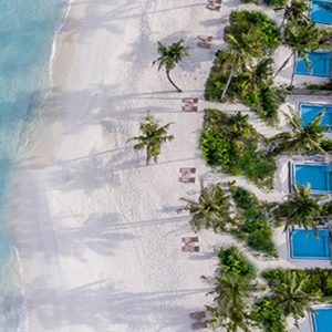 Maldives Honeymoon Packages Fushifaru Pool Beach Villa Sunset3