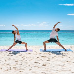 Maldives Honeymoon Packages Reethi Faru Resort Yoga On The Beach1