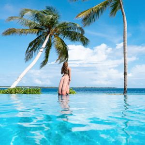 Maldives Honeymoon Packages Reethi Faru Resort Women At Pool