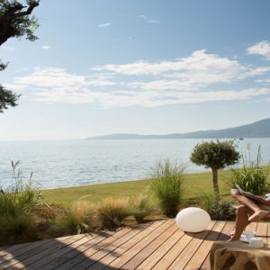 Greece Honeymoon Packages Domes Miramare, Corfu Man Relaxing On Deck