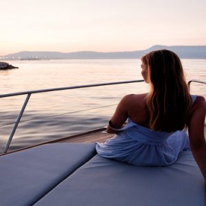 Greece Honeymoon Packages Domes Miramare, Corfu Woman On Yacht1