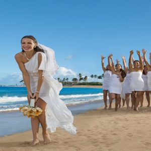 Jamaica Honeymoon Packages Breathless Montego Bay Resort & Spa Bride On Beach Throwing Bouquet