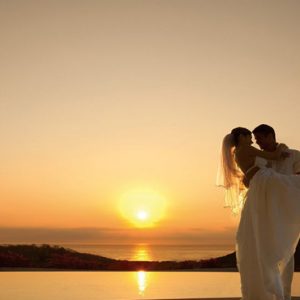 Mexico Honeymoon Packages Secrets Huatulco Resorts & Spa Sunset Couple Wedding