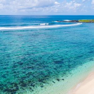 Mauritius Honeymoon Packages Anantara Iko Mauritius Resort & Villas Woman Strolling On Beach