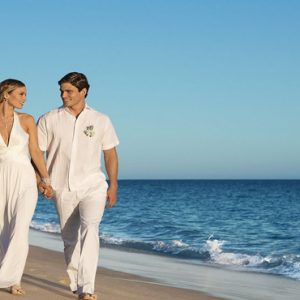 Mexico Honeymoon Packages Secrets Puerto Los Cabos Golf & Spa Resort Bride And Groom On Beach