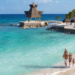 Mexico Honeymoon Packages Dreams Aventuras Riviera Maya Family Walking On Beach