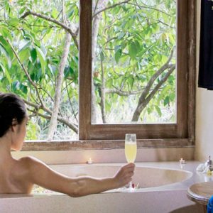 Bali Honeymoon Packages The Kayon Resort By Pramana Woman In Spa Bath