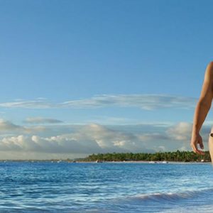 Couple Strolling On Beach Now Emerald Cancun Mexico Honeymoons