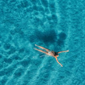 Maldives Honeymoon Packages Innahura Woman Swimming