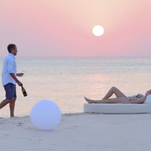 Couple Relaxing On Beach Azura Benguerra Island Mozambique Honeymoons