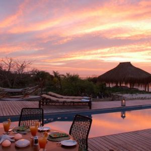 Dining By Pool At Sunset Azura Benguerra Island Mozambique Honeymoons