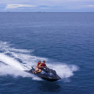 Couple Jet Skiing Pullman Maldives Maamutaa Resort Maldives Honeymoon