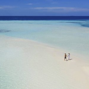 Couple On Sand Bank Pullman Maldives Maamutaa Resort Maldives Honeymoon