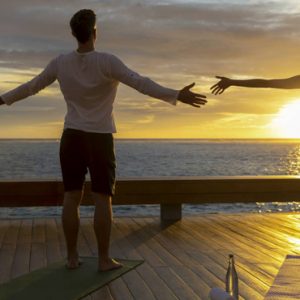 Couple Yoga Sol Rising Pullman Maldives Maamutaa Resort Maldives Honeymoon