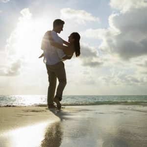 Couple On White Sandy Beach Pullman Maldives Maamutaa Resort Maldives Honeymoon